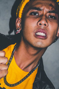 Portrait of young man looking away