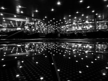 Reflection of illuminated buildings in water at night