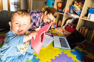 Women sitting on laptop at home