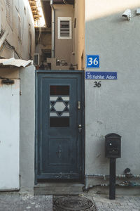 Text on closed door of building