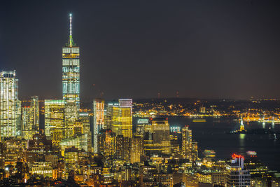 Illuminated buildings in city at night