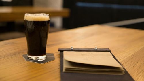 Close-up of beer on table