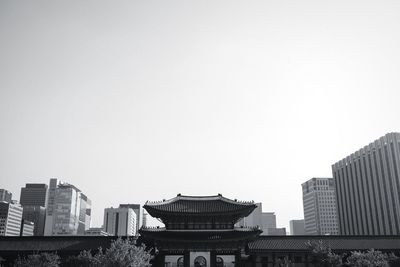 Low angle view of buildings against clear sky