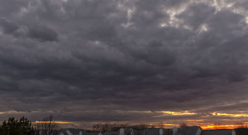 Scenic view of landscape against cloudy sky