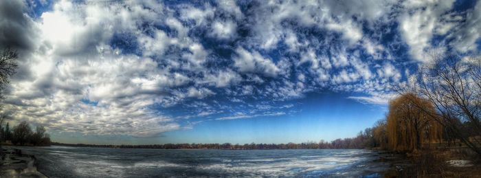 Panoramic view of landscape against sky during winter