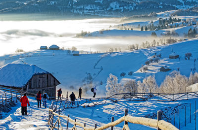 Panoramic view of snow covered land and mountains