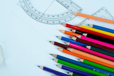 High angle view of colored pencils on table