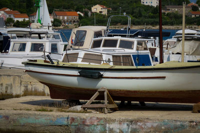 Boats moored at harbor