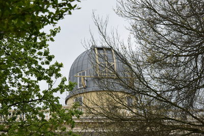 Low angle view of water tower against sky