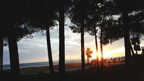 Scenic view of sea against sky at sunset