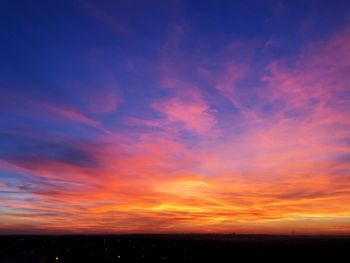 Scenic view of dramatic sky during sunset