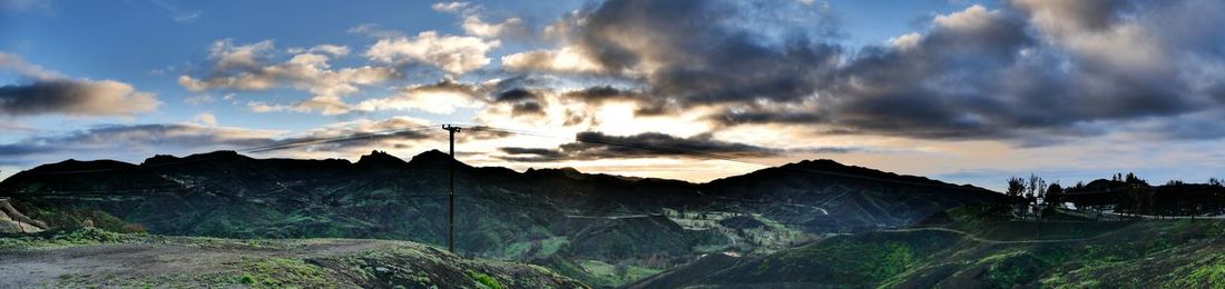 Panoramic view of landscape against sky during sunset