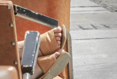 Close-up of person holding camera