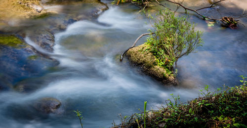 Stream flowing through rocks