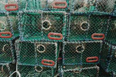 Full frame shot of stacked lobster traps at harbor