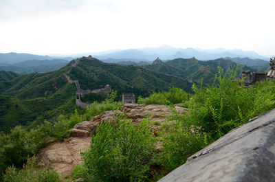 High angle view of great wall of china against mountains