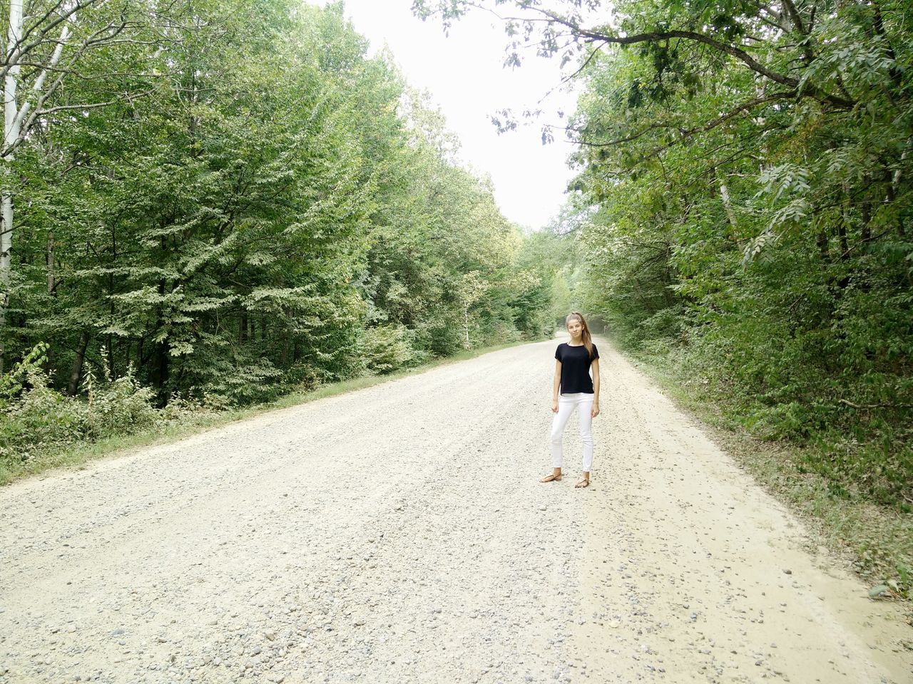 rear view, full length, road, the way forward, casual clothing, walking, tree, one person, real people, day, nature, outdoors, adult, people