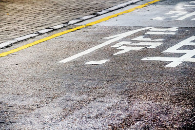 High angle view of text on road