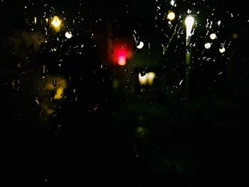 Close-up of illuminated water at night