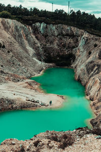 High angle view of rocks in lake