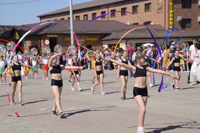 Group of people in town square