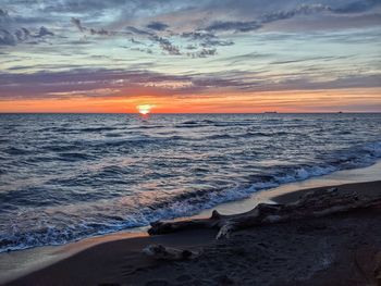 Scenic view of sea against sky during sunset