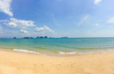 Scenic view of beach against sky