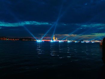 Scenic view of sea against sky at night