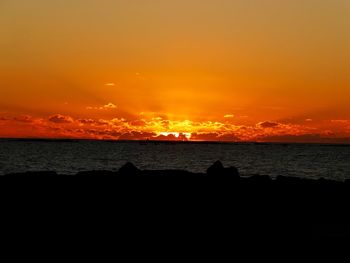 Scenic view of sea at sunset