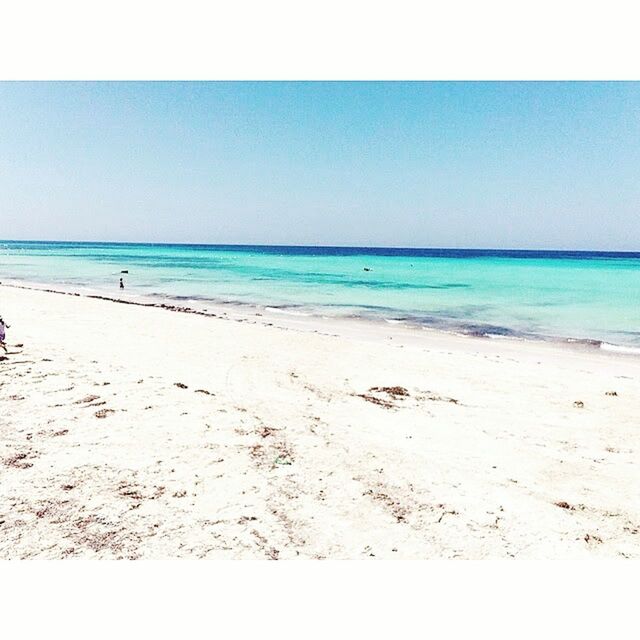 sea, horizon over water, beach, water, sand, shore, blue, clear sky, tranquil scene, tranquility, scenics, copy space, beauty in nature, nature, transfer print, sky, auto post production filter, idyllic, day, outdoors