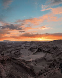 Scenic view of landscape against sky during sunset