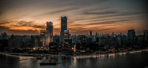 High angle view of city at sunset