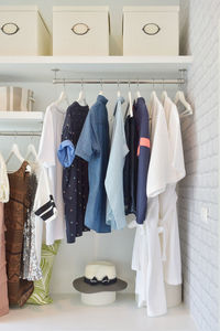 Clothes hanging on rack at home