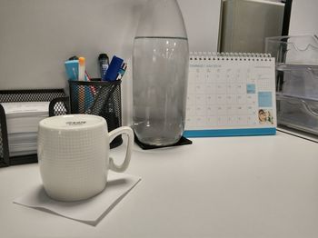 Close-up of coffee cup on table