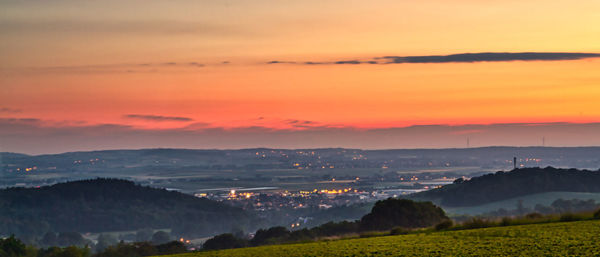 Scenic view of landscape against sky during sunset