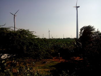 Low angle view of windmill against clear sky