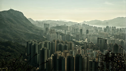 Aerial view of cityscape against sky