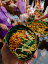 Close-up of hand holding food