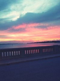 Scenic view of beach against sky during sunset