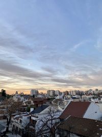 High angle view of townscape against sky during sunset