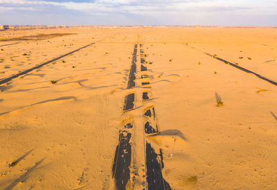 Tire tracks on sand dune