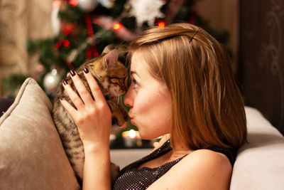 Side view of young woman looking away