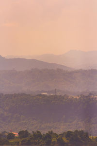 Scenic view of mountains against sky during sunset