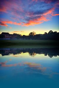 Scenic view of lake at sunset