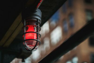 Low angle view of illuminated electric light