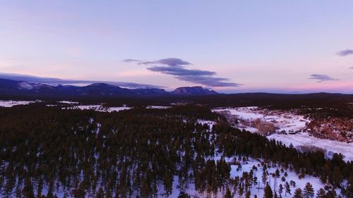 Scenic view of lake against sky at sunset