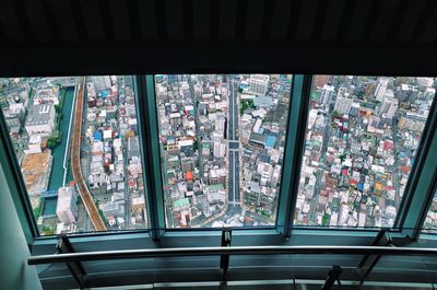 High angle view of glass window in city