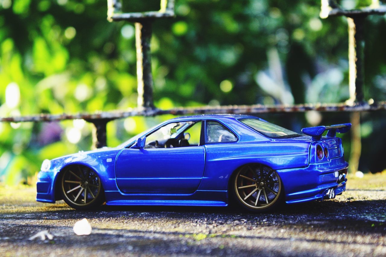 car, no people, outdoors, day, close-up, racecar, motorsport