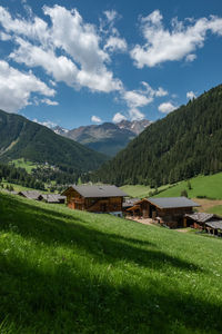 Scenic view of landscape and mountains against sky