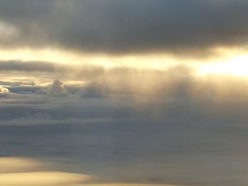 Low angle view of clouds in sky during sunset